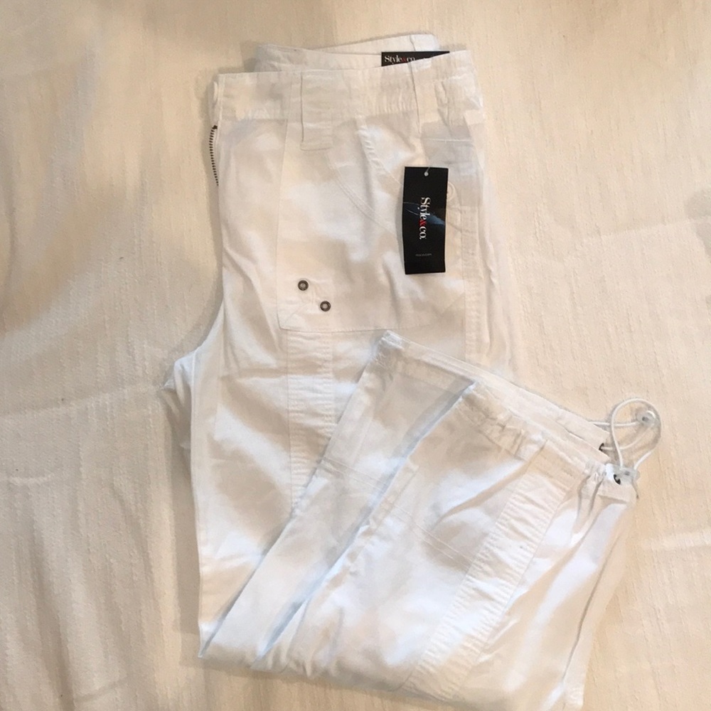 NWT and extra white button. White capri pants.